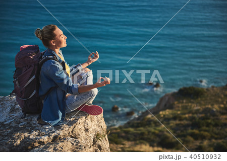 Female tourist plunging into nirvana on nature Female tourist plunging into nirvana on nature 40510932