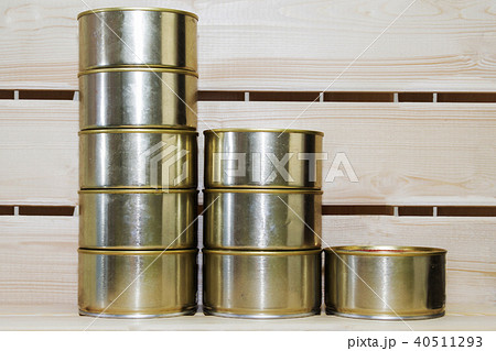 A number of covered metal cans yellow. A number of covered metal cans yellow. 40511293