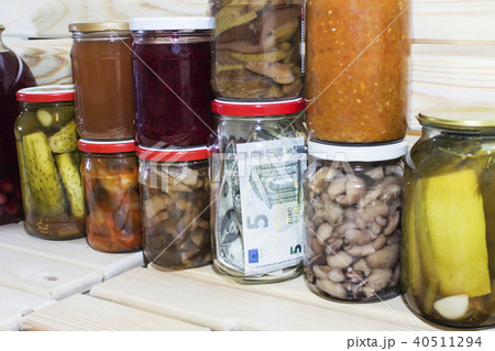 five euros in a glass jar on the background five euros in a glass jar on the background 40511294