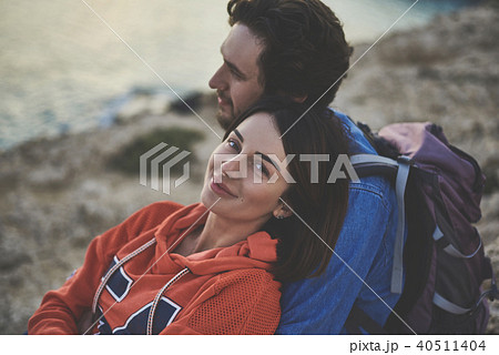 Relaxed loving couple enjoying ocean view Relaxed loving couple enjoying ocean view 40511404