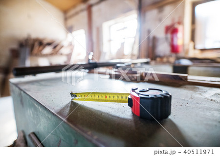 A flexible ruler in a carpentry workshop. A flexible ruler in a carpentry workshop. 40511971