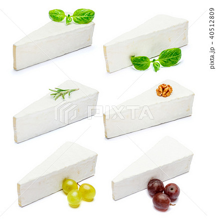Set of Pieces of brie or camambert cheese on a white 40512809