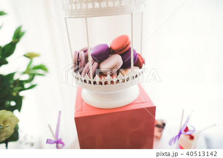 Delicious sweets on wedding candy buffet with desserts, cupcakes 40513142