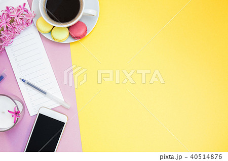 Creative flat lay with coffee cup and macaroons Creative flat lay with coffee cup and macaroons 40514876