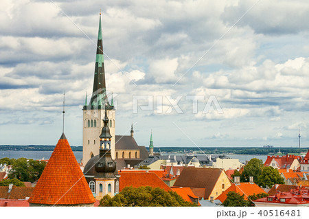 View of Tallinn Old Town, Baltic Sea and St. Olaf in cloudy summer day, Estonia 40516481