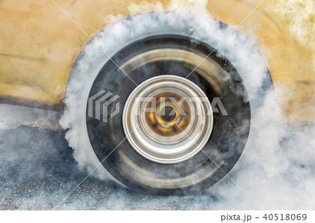 Drag racing car burn tire at start line Drag racing car burn tire at start line 40518069