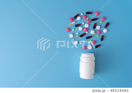 medicine pills on blue background Copy space medicine pills on blue background Copy space 40519483