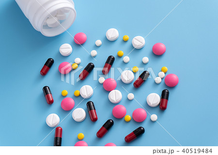 medicine pills on blue background Copy space medicine pills on blue background Copy space 40519484