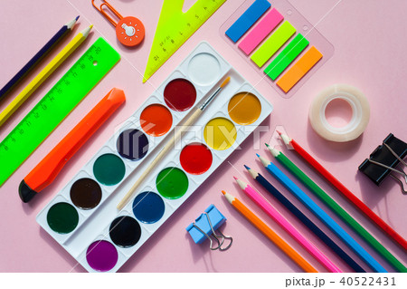 square frame with stationery on pink background. 40522431