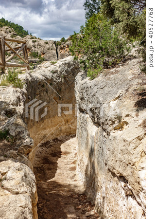 Old aqueduct carved in rock 40527768