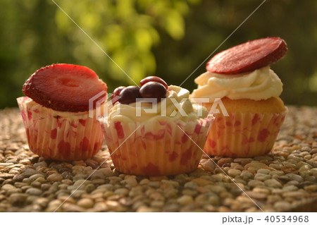 Sweet cakes on stony table 40534968