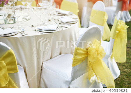 Spandex white cover chairs yellow organza sash Spandex white cover chairs yellow organza sash 40539321