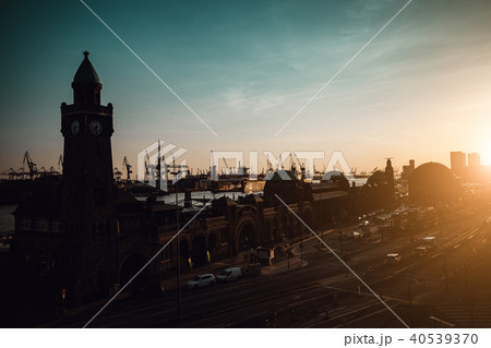 Silhouette of famous Hamburger Landungsbruecken with commercial harbor and Elbe river in late 40539370