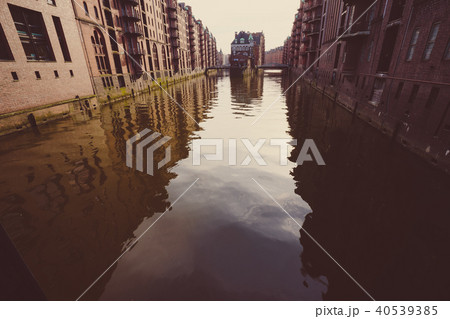 The Warehouse District - Speicherstadt in evening light. Tourism landmark of Hamburg. View of The Warehouse District - Speicherstadt in evening light. Tourism landmark of Hamburg. View of 40539385