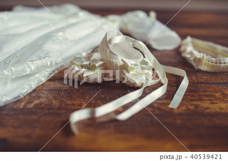 christening baby dress and shoes. Close-up  40539421
