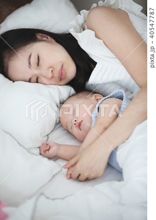 beautiful asian woman and her son little baby sleeping together beautiful asian woman and her son little baby sleeping together 40547787