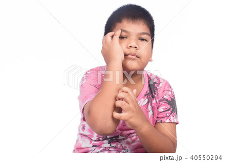 Cute little boy scratch his arm Cute little boy scratch his arm 40550294