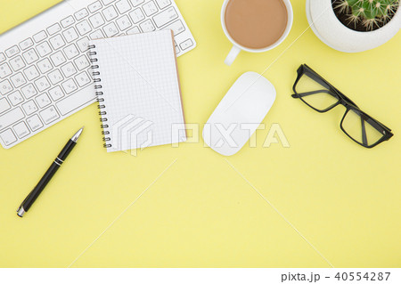 workspace with tablet, keyboard, coffee cup workspace with tablet, keyboard, coffee cup 40554287