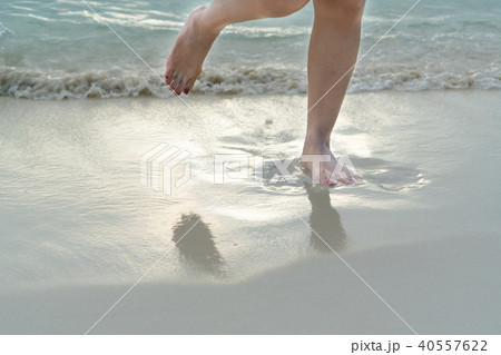 travel girl walking on white sand beach relax time 40557622