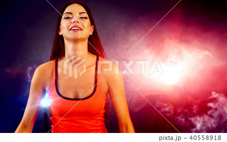 Fitness trainer aerobics woman exercising in gym with . 40558918