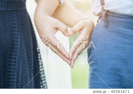 Young male and female couple marry show holding 40561671