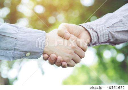 Close up of a business man hand shake Close up of a business man hand shake 40561672