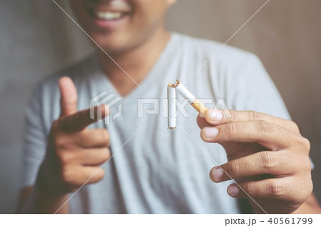 A new generation of businessman refusing cigarette 40561799