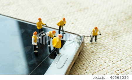 figurine model repair mobile crash with repairman figurine model repair mobile crash with repairman 40562036