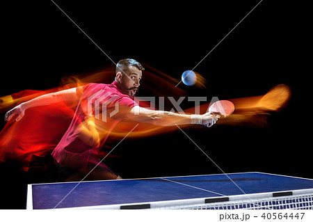 The table tennis player serving 40564447