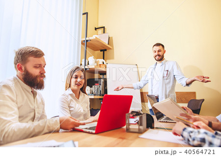 Team job. Photo young businessmans working with new project in office 40564721