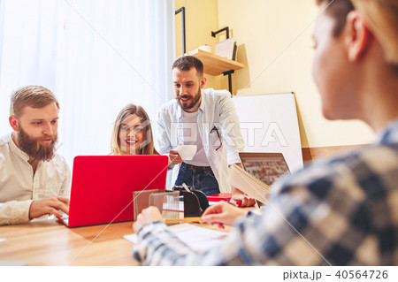 Team job. Photo young businessmans working with new project in office 40564726