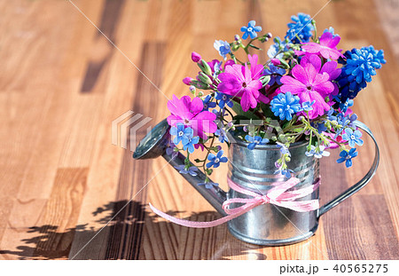bouquet in garden watering can bouquet in garden watering can 40565275
