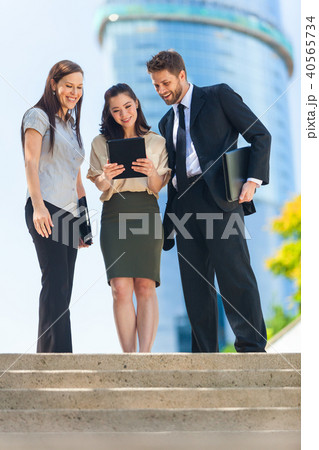 City Business Man Woman Team Using Tablet Computer 40565734