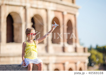 Young girl in front of Colosseum in rome, italy Young girl in front of Colosseum in rome, italy 40569108