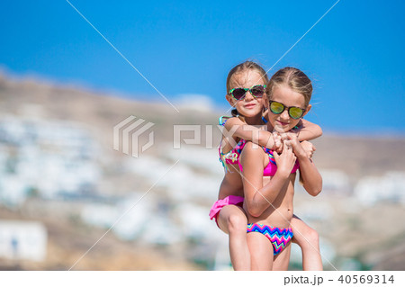 Adorable little girl at Little Venice the most popular tourist area on Mykonos island, Greece. 40569314