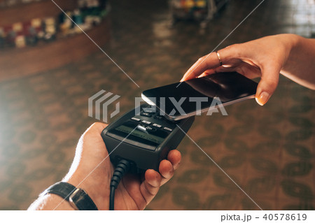 Payment by smartphone through payment terminal Payment by smartphone through payment terminal 40578619