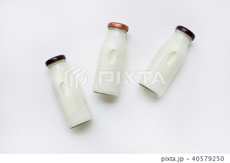 Milk bottle on white background. 40579250