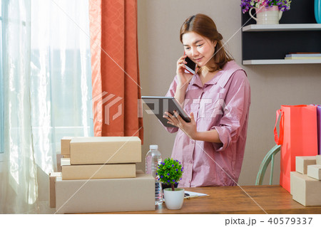 Young asian online seller businesswoman working Young asian online seller businesswoman working 40579337