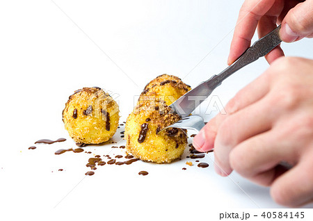 Person cut breadcrumb dumpling Person cut breadcrumb dumpling 40584145