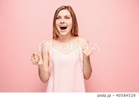 Winning success woman happy ecstatic celebrating being a winner. Dynamic energetic image of female 40584529