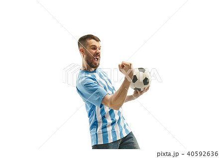 The Argentinean soccer fan celebrating on white background The Argentinean soccer fan celebrating on white background 40592636