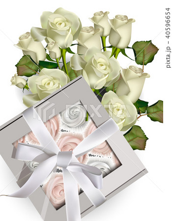 Sweet meringues gift box and white roses 40596654