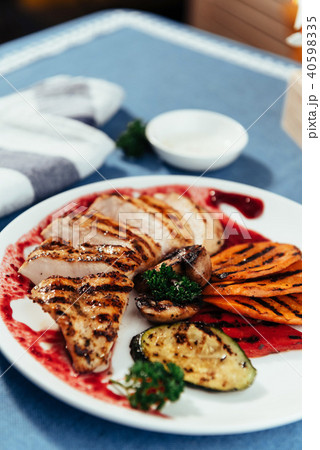 Grilled vegetables and chicken fillet. Traditional cuisine. Gril 40598335