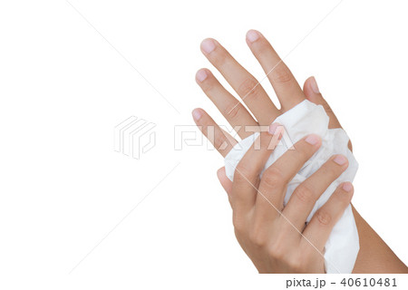 Woman cleaning her hands with a tissue 40610481