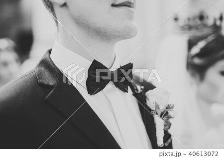 Married couple posing in a church after ceremony 40613072