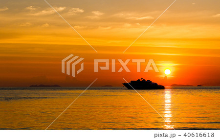 Ferry boat on the sea at sunset background. 40616618