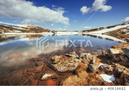 Lake between mountains. Spring landscape. Carpathians. Ukraine Lake between mountains. Spring landscape. Carpathians. Ukraine 40616682