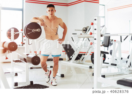 Beautiful man with big muscles, posing for the camera Beautiful man with big muscles, posing for the camera 40628376