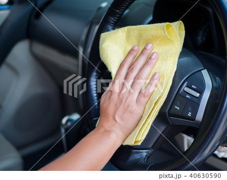 Hand cleaning interior car steering wheel 40630590