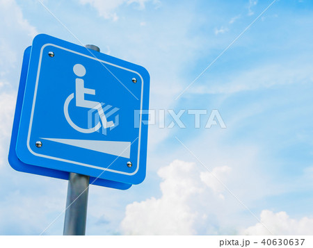 Wheelchair symbol in a parking lot  40630637